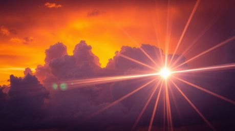 Capture the dramatic beauty of nature with this long exposure photograph showcasing thunderstorm clouds illuminated by the vi