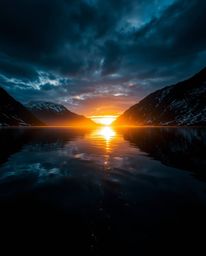 An artwork capturing the reflection of a sunset in a glassy fjord, defined by its intense dramatic lighting and high contrast