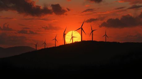 A digital painting inspired by eerie Isekai anime, showcasing a dramatic sunset backdrop behind a row of wind turbines perche