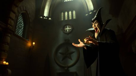 A cinematic depiction of a classic Disney villain casting a spell in an old castle, this scene evokes a film-like quality wit