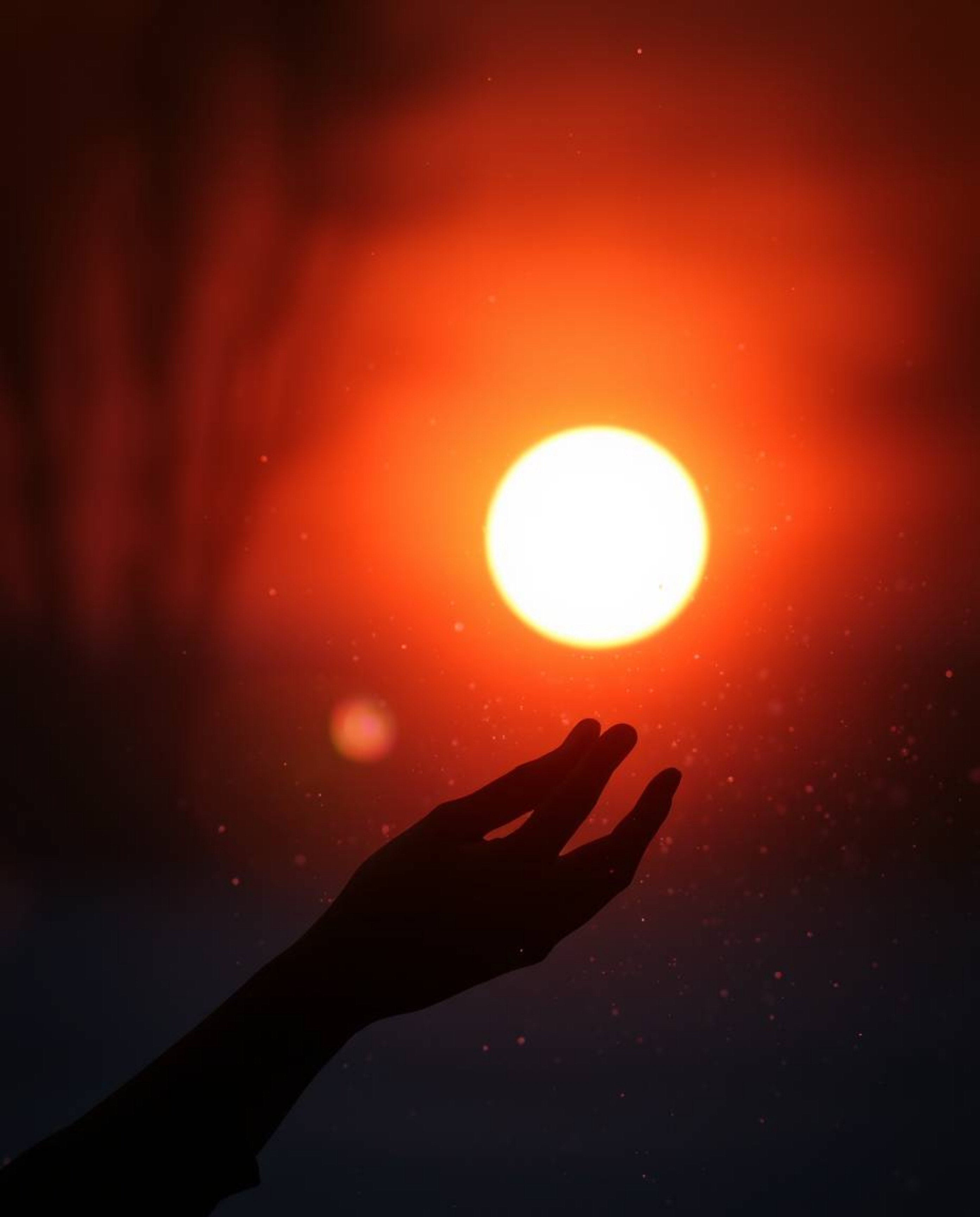 An image with an ethereal and spiritual vibe, depicting snowflakes falling during a vibrant sunset. It features high contrast