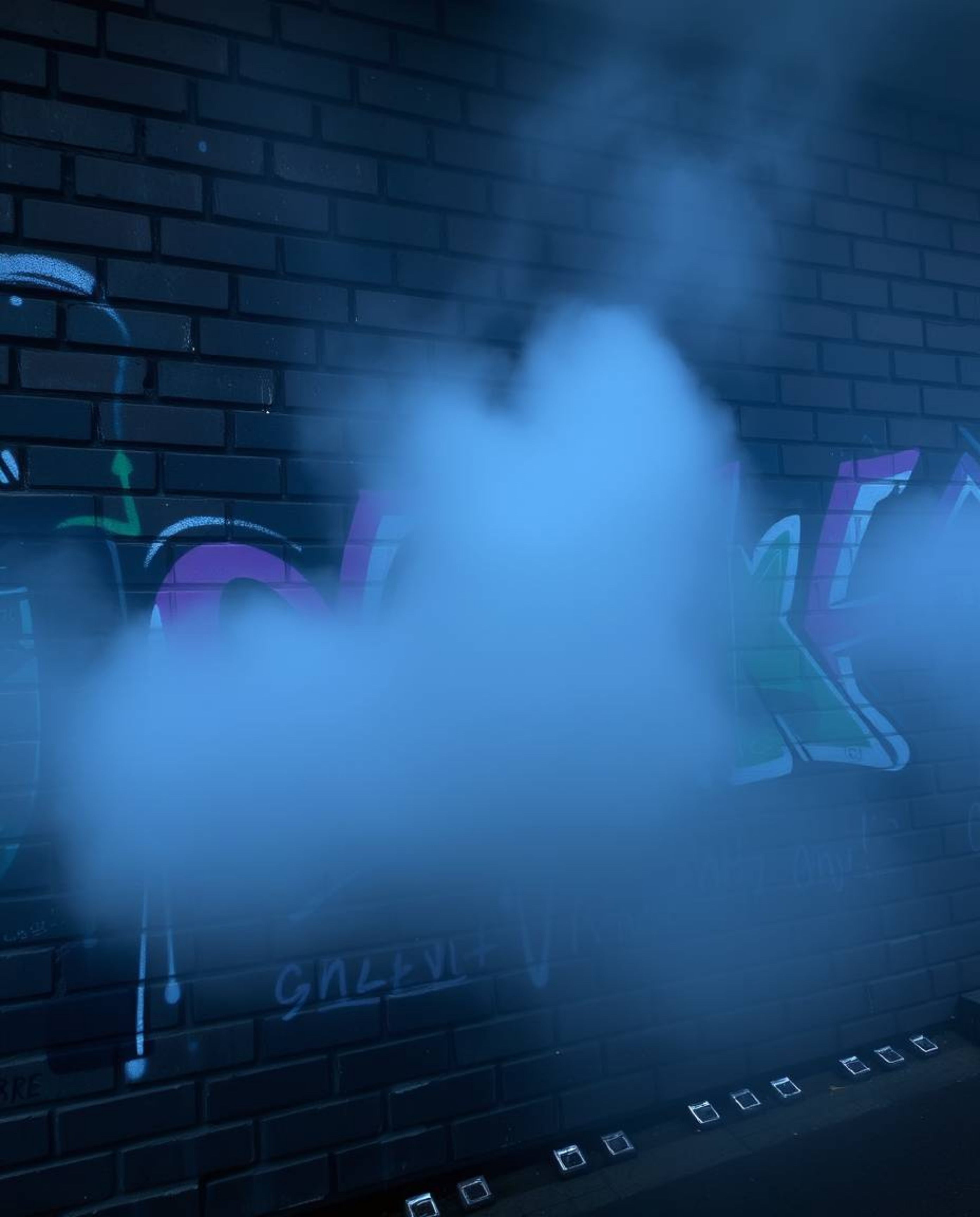 Explore a captivating fusion of street art and futuristic aesthetics in these images. Colorful graffiti splashes across a bri