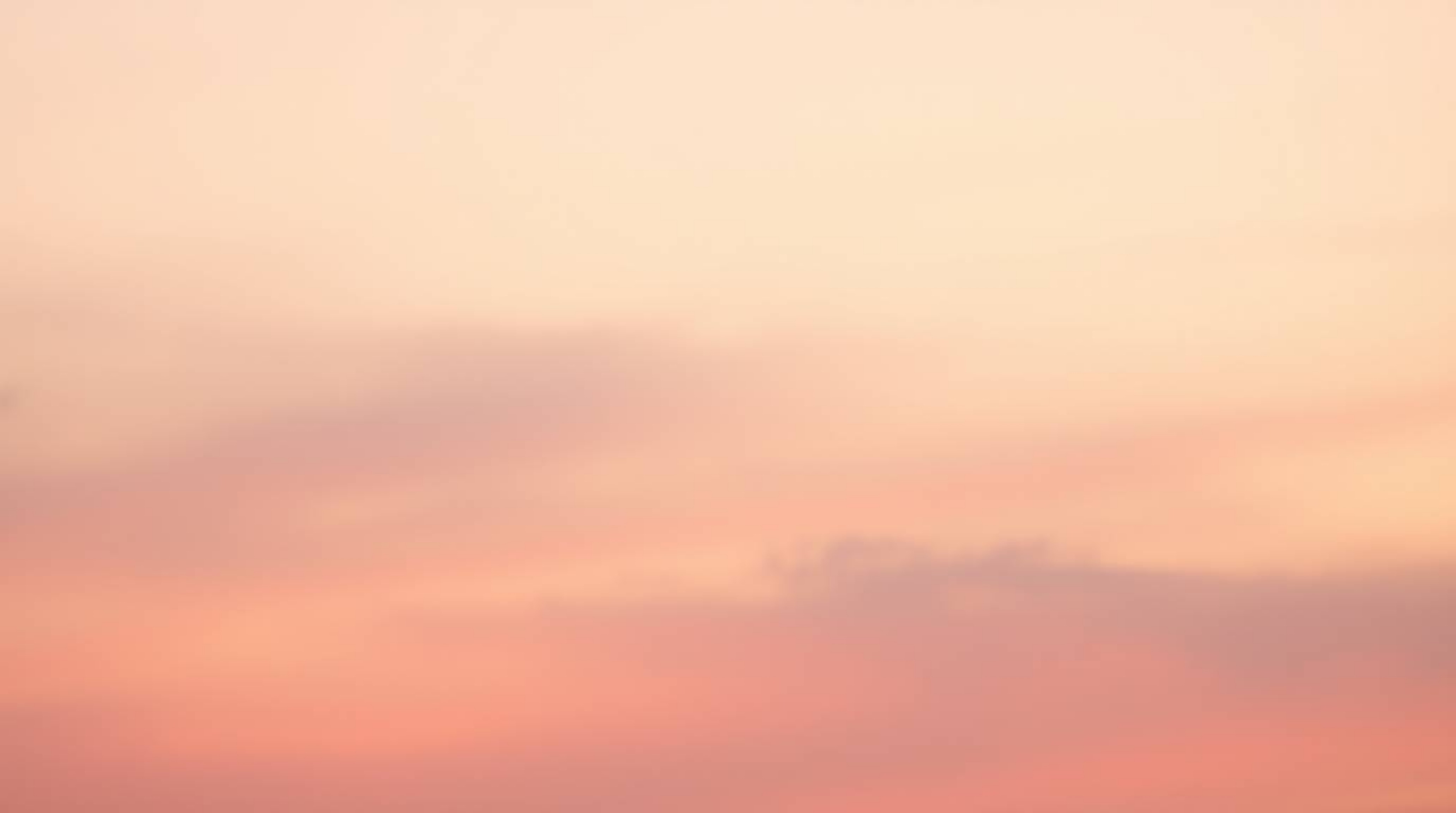 This image features a distinct split composition with a gentle, soft light.  The gradient sunset sky texture creates a soft a