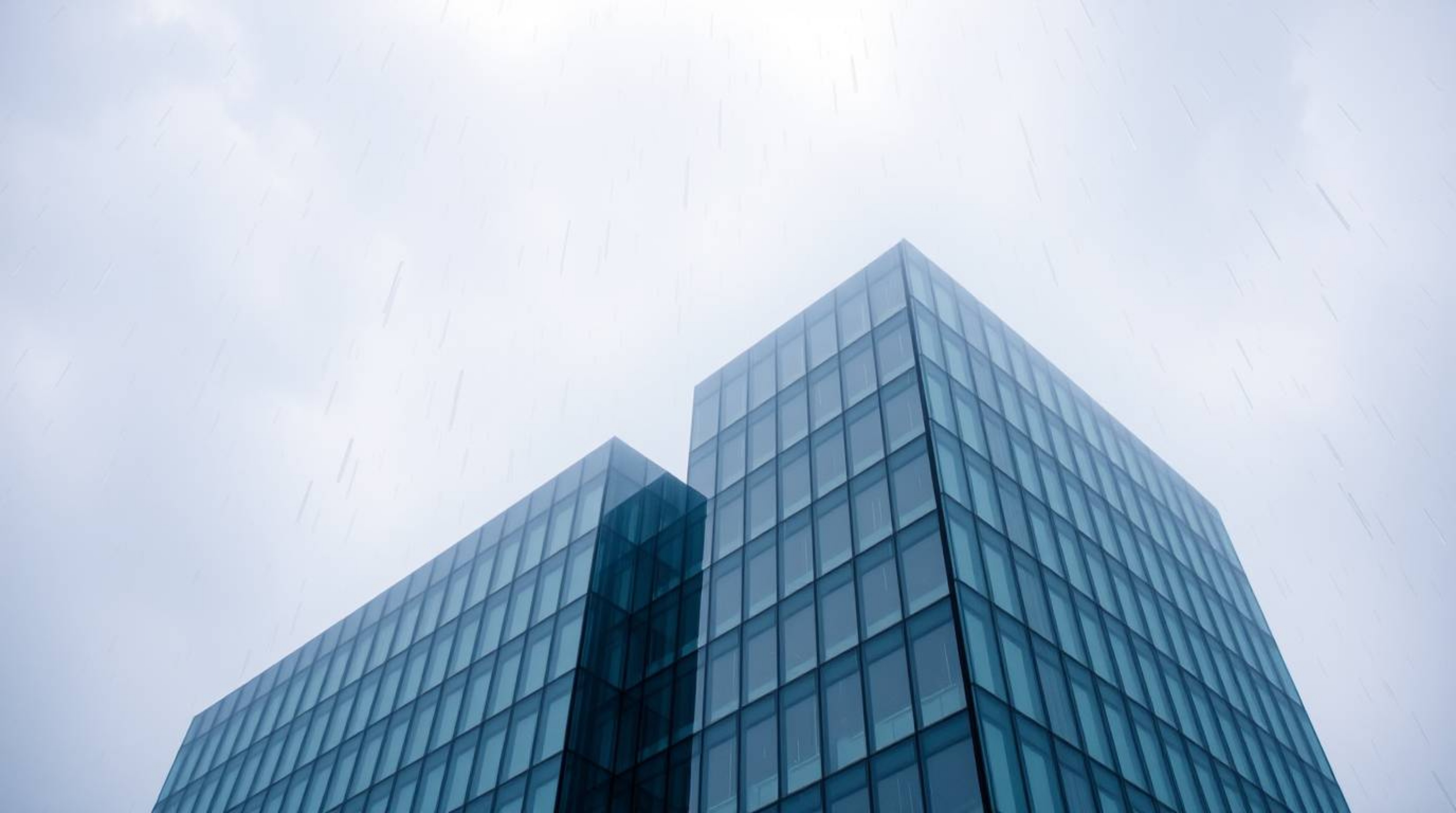 A modern glass building seamlessly blends into a rain-swept sky, with soft clouds appearing to merge with its structure, crea
