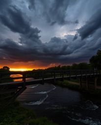 A dark and moody depiction of an old wooden bridge over a river at sunset. The scene is characterized by stormy skies and int