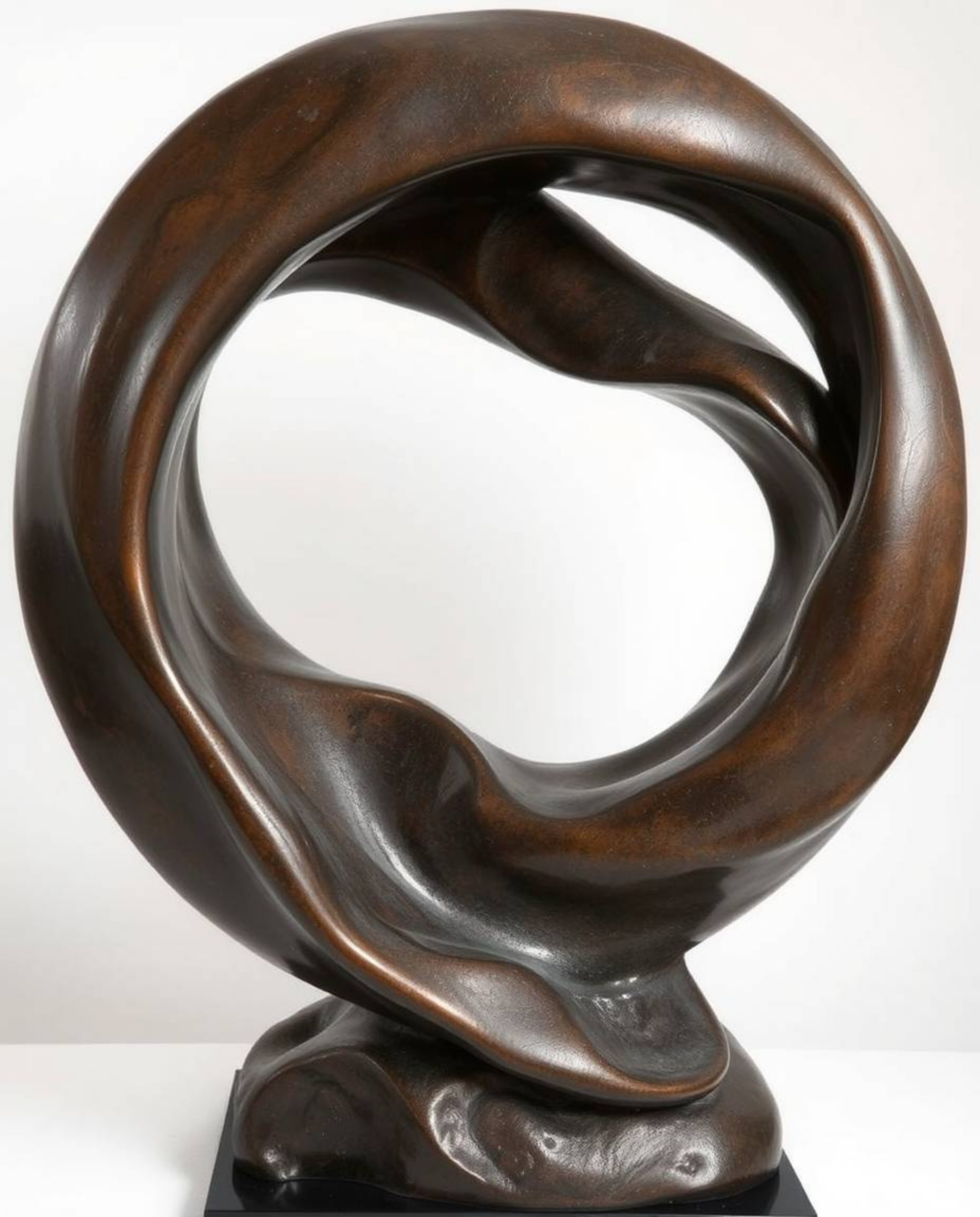 A mesmerizing 3D illustration showcases cast bronze fluid shapes morphing into each other in an endless loop. The artwork fea