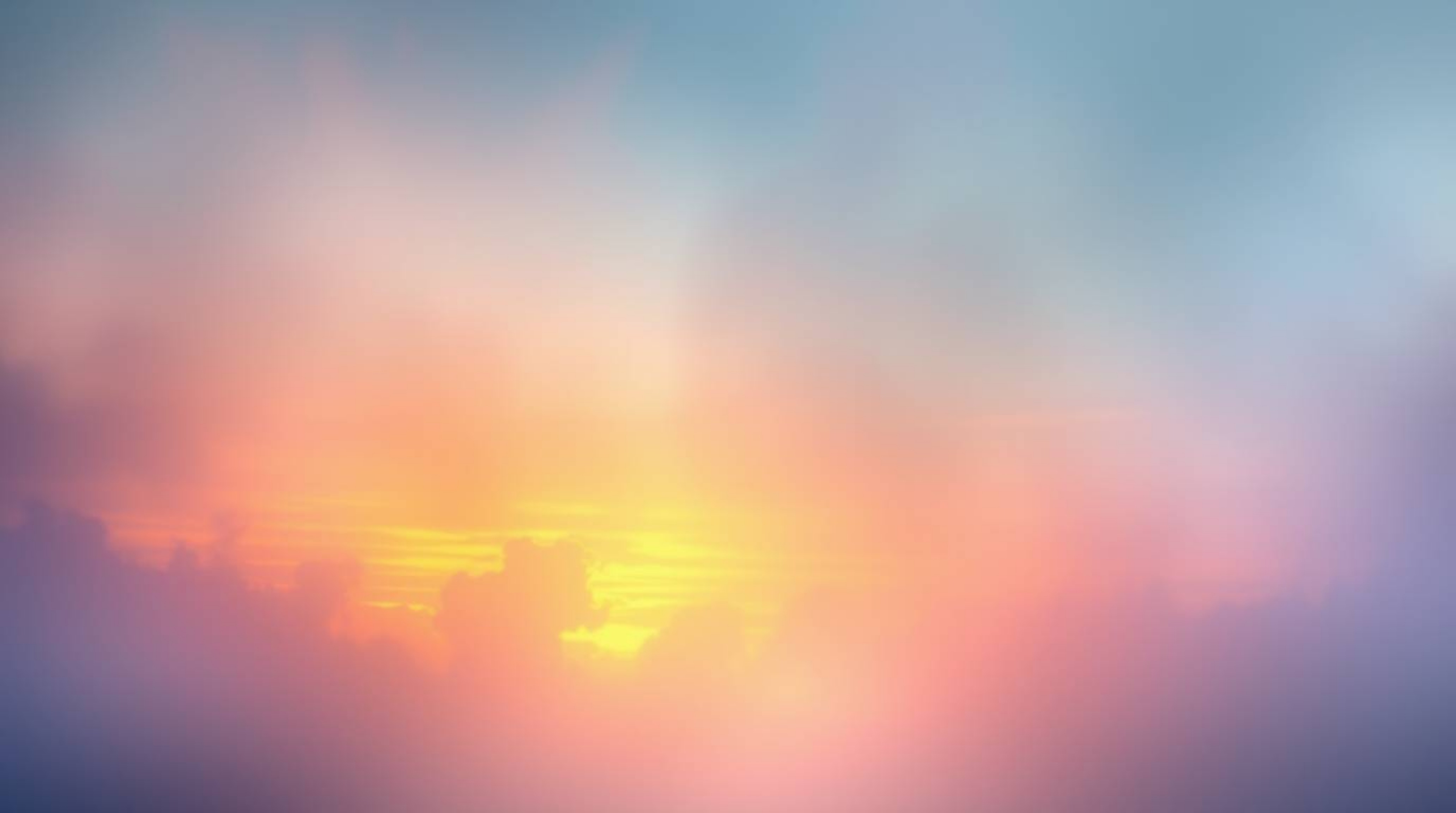 Experience a mystic and enchanting environment bathed in a sunset gradient texture, where soft, dreamy colors create gentle c