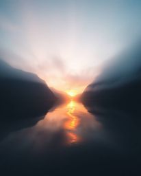 A cinematic photograph of a glassy fjord reflecting a sunset, shot from a low angle with a distinct split and a soft haze. Ke