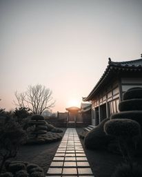 Precise architectural color photography in classic black and white depicting a sunset over a serene Zen garden with timeless 