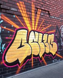 Discover stunning, radiant graffiti art on a brick wall.  This captivating image showcases warm golden glows and vibrant, col