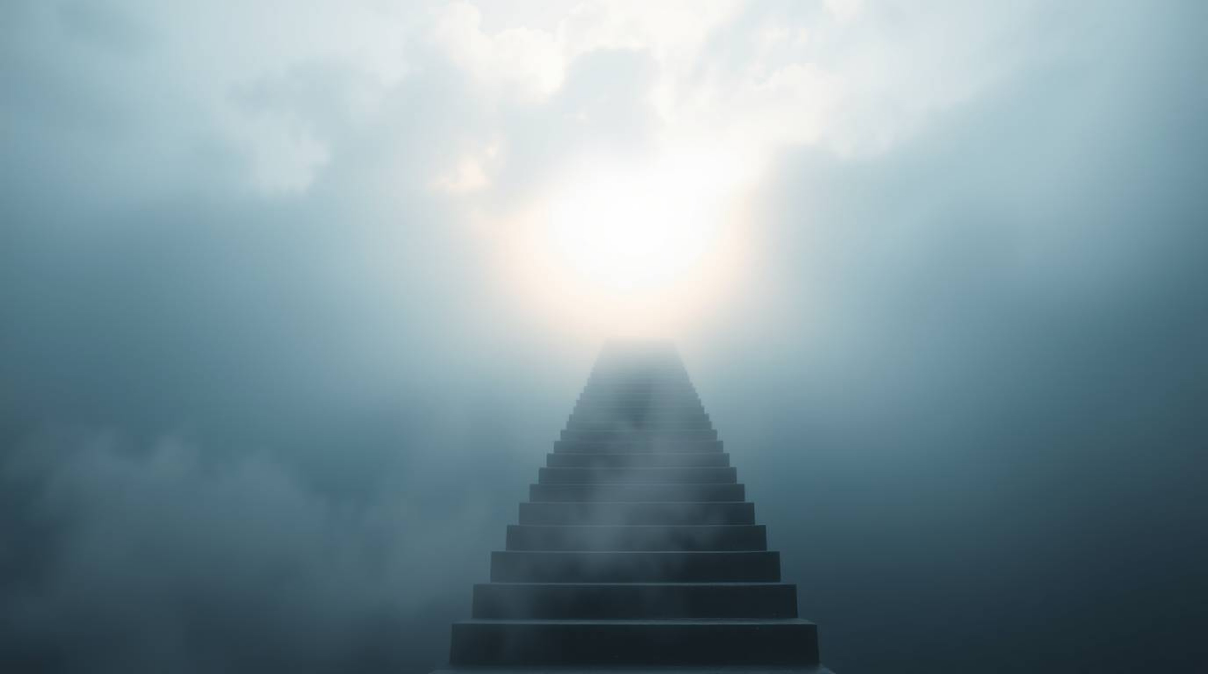 A surreal image depicts a sharply focused stairway winding through smoky clouds towards a bright celestial light.  Enveloped 
