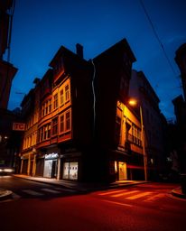 Explore a surreal street scene captured with long exposure photography, featuring buildings that fold and twist in impossible