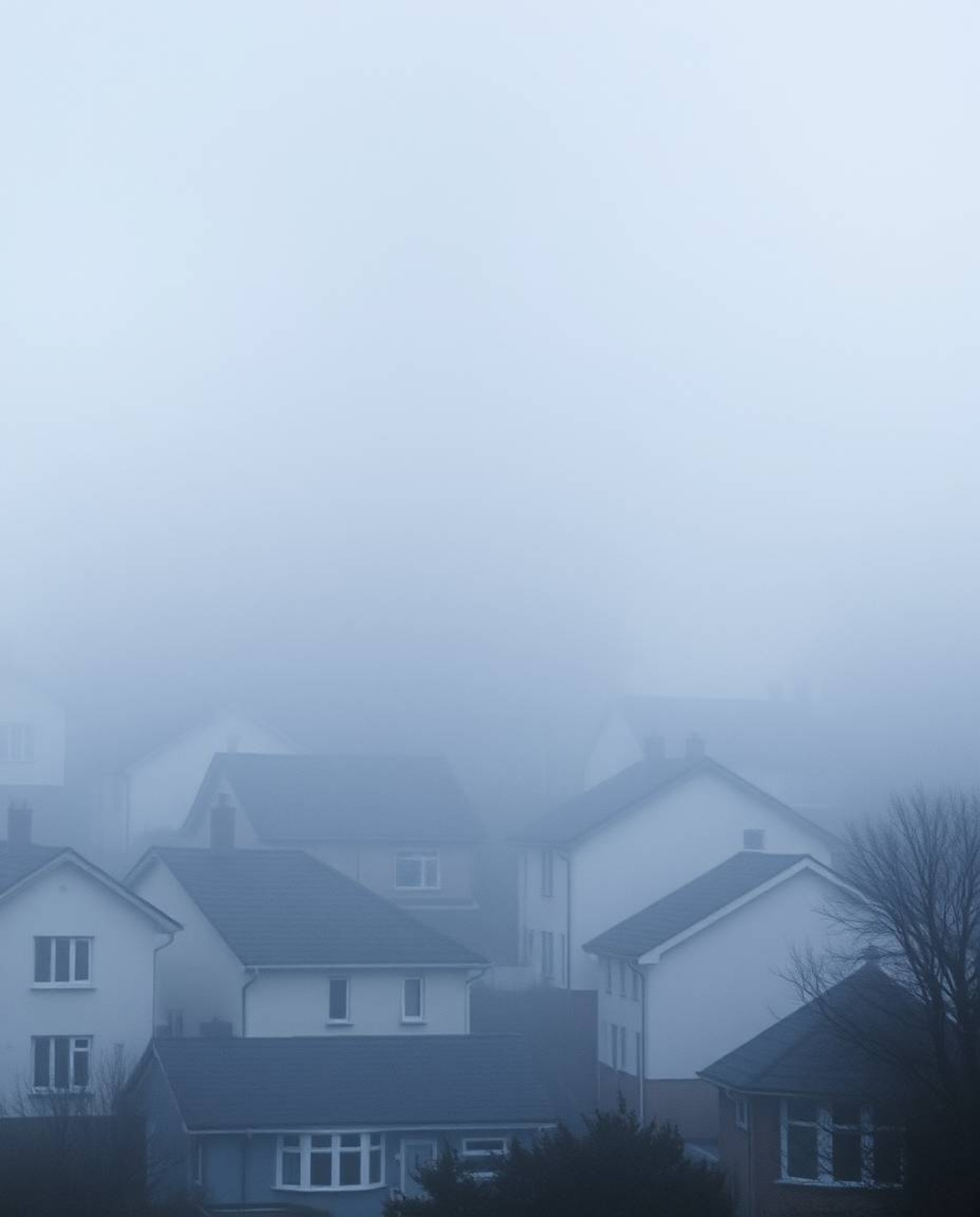 Escape to a dreamy watercolor landscape featuring a sleepy town with pastel-colored houses bathed in soft, hazy light.  This 
