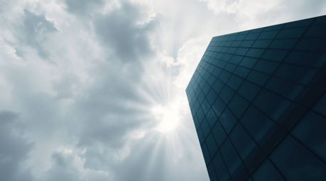 Explore the captivating concept of ambition and infinity with this series of images featuring a modern glass building dissolv