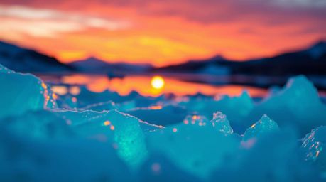 Experience the breathtaking beauty of a bioluminescent sunset painting the icy polar glaciers with a vibrant glow. This tight