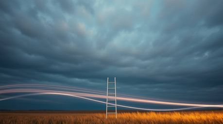 Explore captivating creative light art photography featuring a minimalist scene: a silver ladder standing in an open field be