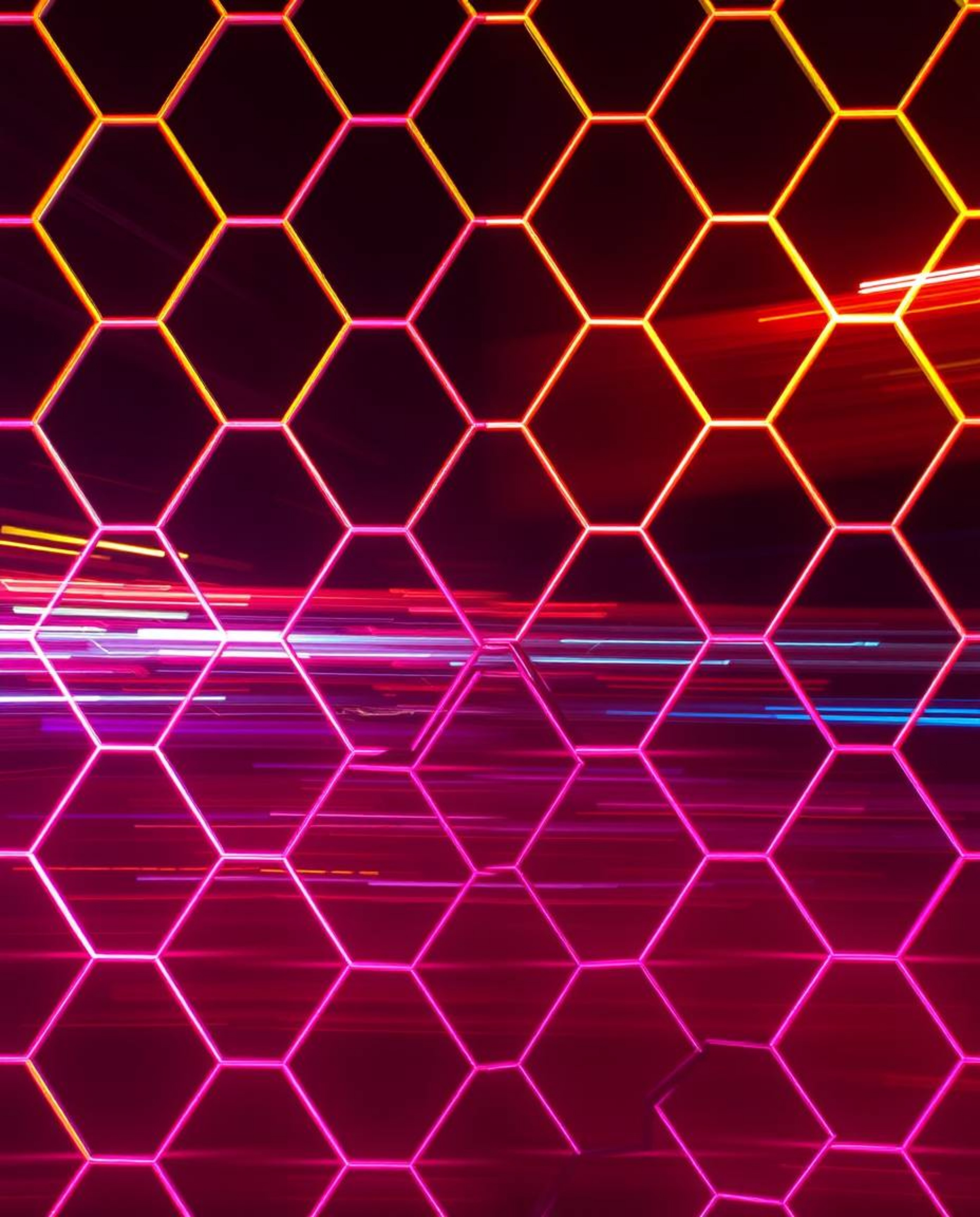 A captivating long exposure photograph showcases a mesmerizing seamless geometric pattern of hexagons and triangles bathed in