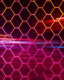 A captivating long exposure photograph showcases a mesmerizing seamless geometric pattern of hexagons and triangles bathed in