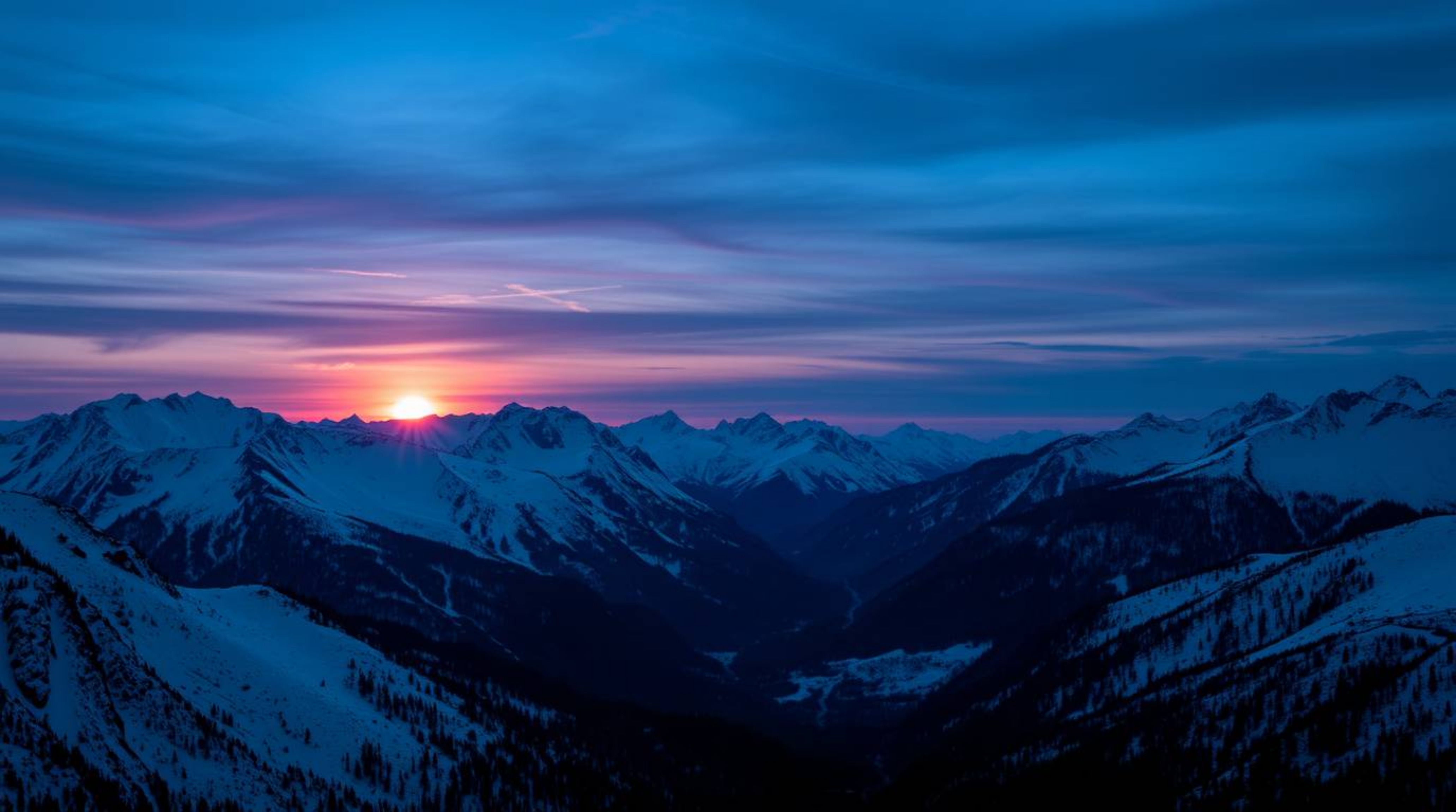 Capture the serene beauty of snow-covered mountains bathed in the ethereal glow of a pastel sunset. This cool-toned image fea