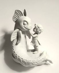 Discover a timeless, elegant black and white sculptural clay artwork depicting an unlikely friendship between a sea creature 