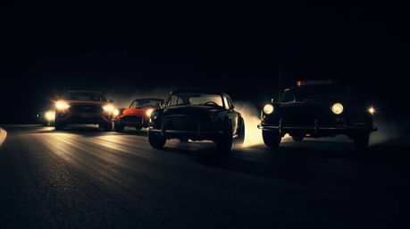 Experience a high-octane, wacky racing scene featuring outlandish cars captured from a dramatic low angle.  This image utiliz