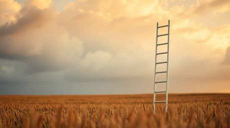 This high-resolution stock photo captures an extreme macro close-up of a minimalist scene featuring a silver ladder in an ope