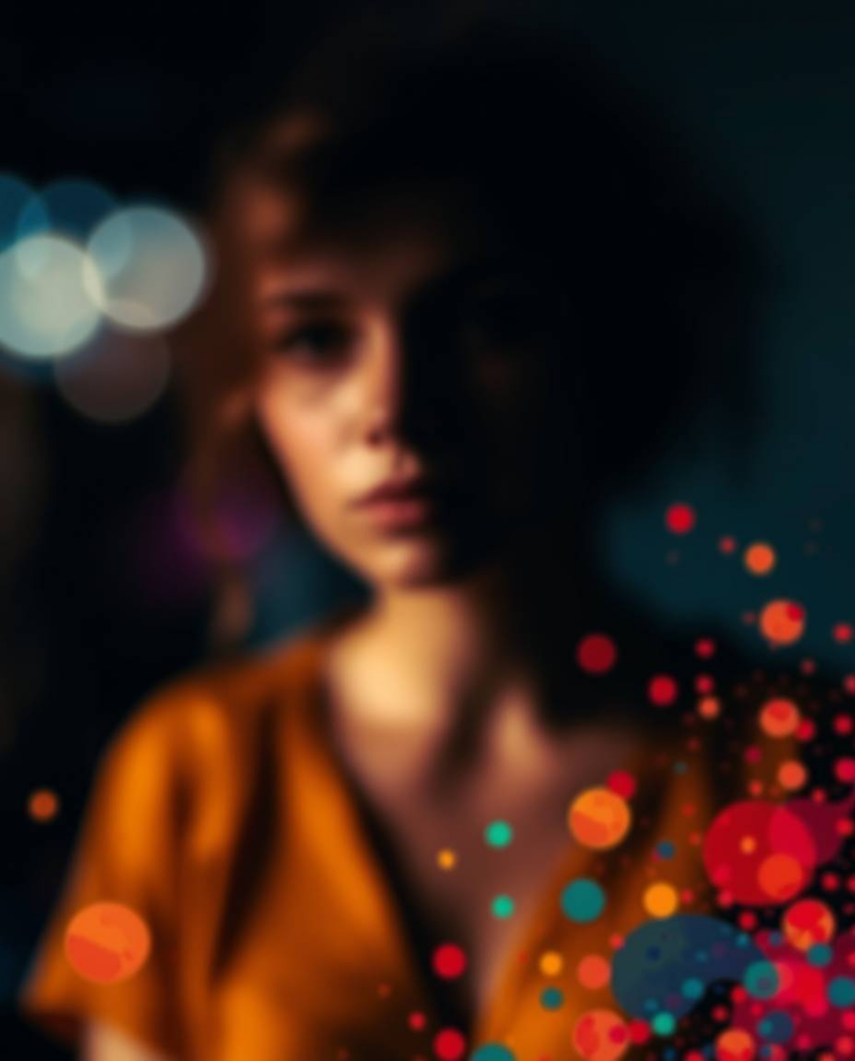 Experience the captivating blend of vibrant watercolor splashes and a blurred bokeh effect.  This image showcases strong cont
