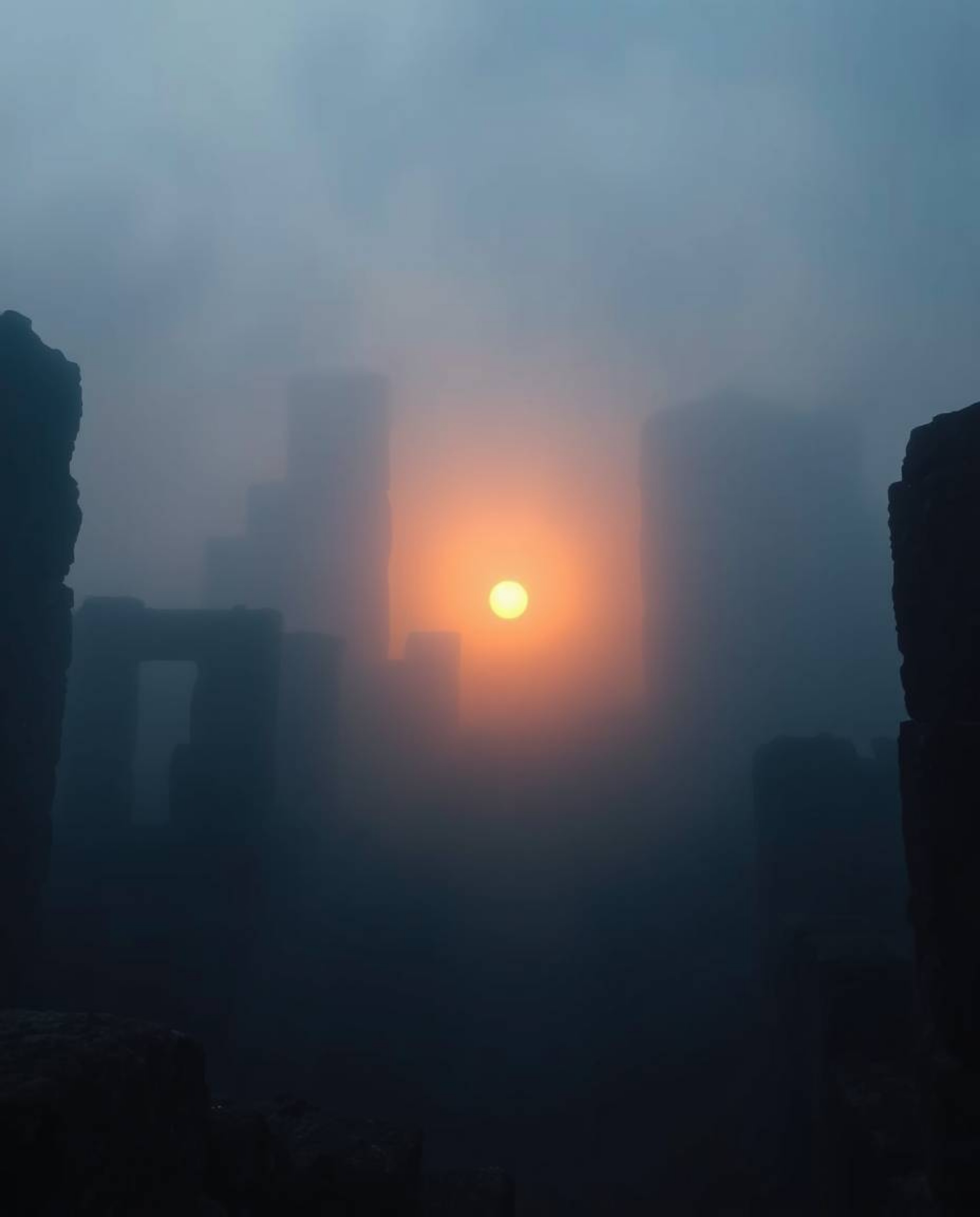 Experience a dramatic cinematic scene of ancient stone ruins at sunset, shrouded in thick fog. The atmosphere is moody and my