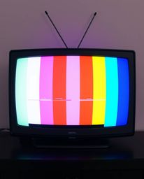 Experience the mesmerizing visual chaos of a TV screen split into vibrant sections, each showcasing RGB separated glitch stat