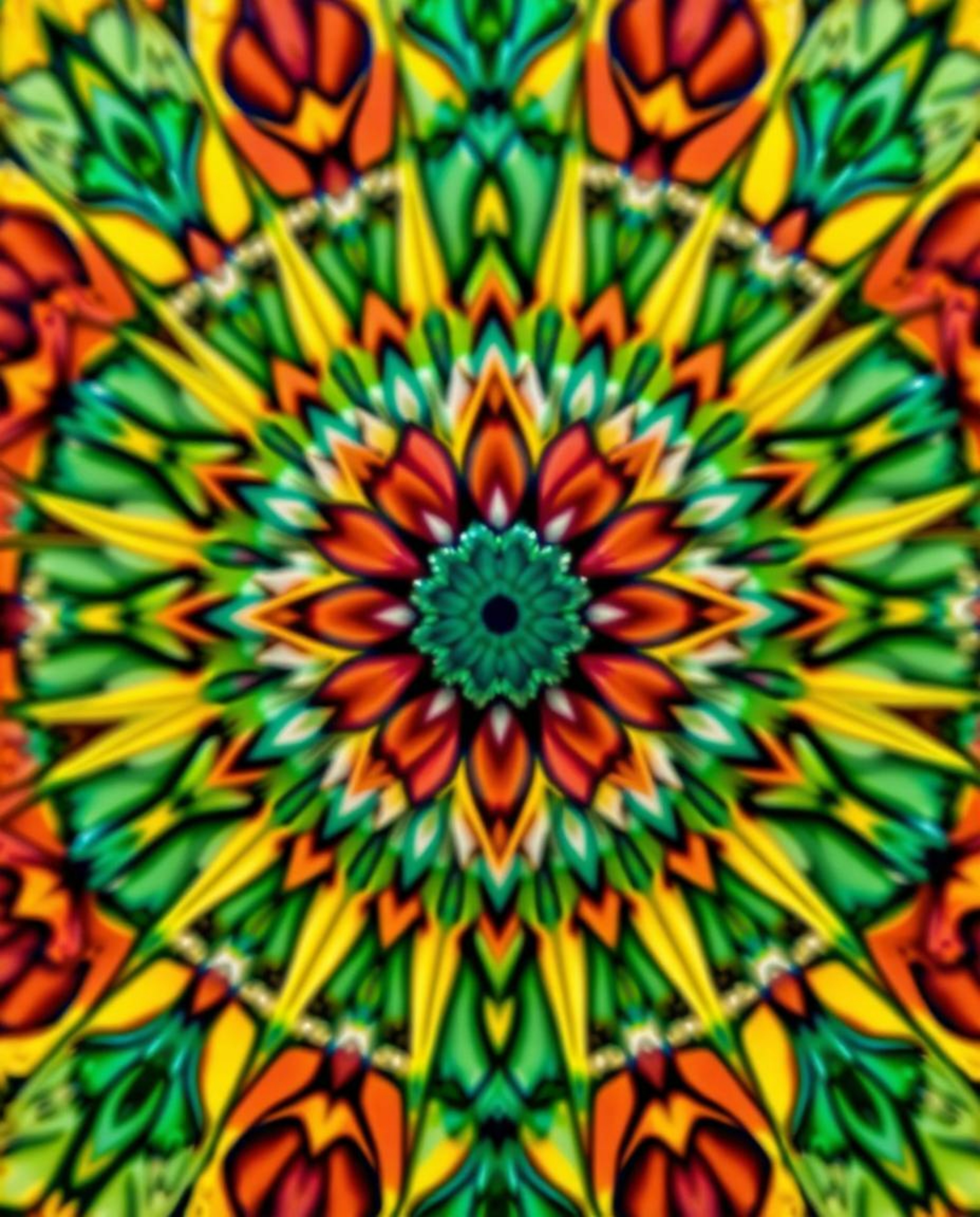 A captivating close-up reveals a stunning geometric floral mandala, bursting with vibrant colors and showcasing its perfectly