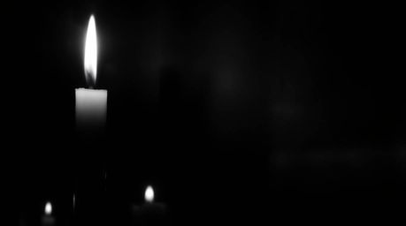 Capture the essence of ethereal spiritual vibes with warm candlelight in a classic black and white image.  Inspired by the me