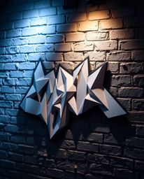 Discover stunning photography of intricate origami-style graffiti art adorning a brick wall.  Soft pastel colors and precise 