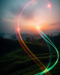 This is an artistic depiction of a sunset over terraced tea plantations, uniquely characterized by its focus on creative ligh