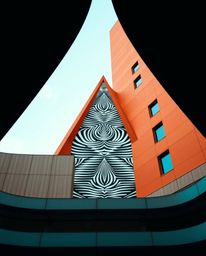 This collection features dramatic, cinematic-style architectural color photographs showcasing a unique blend of warm terracot