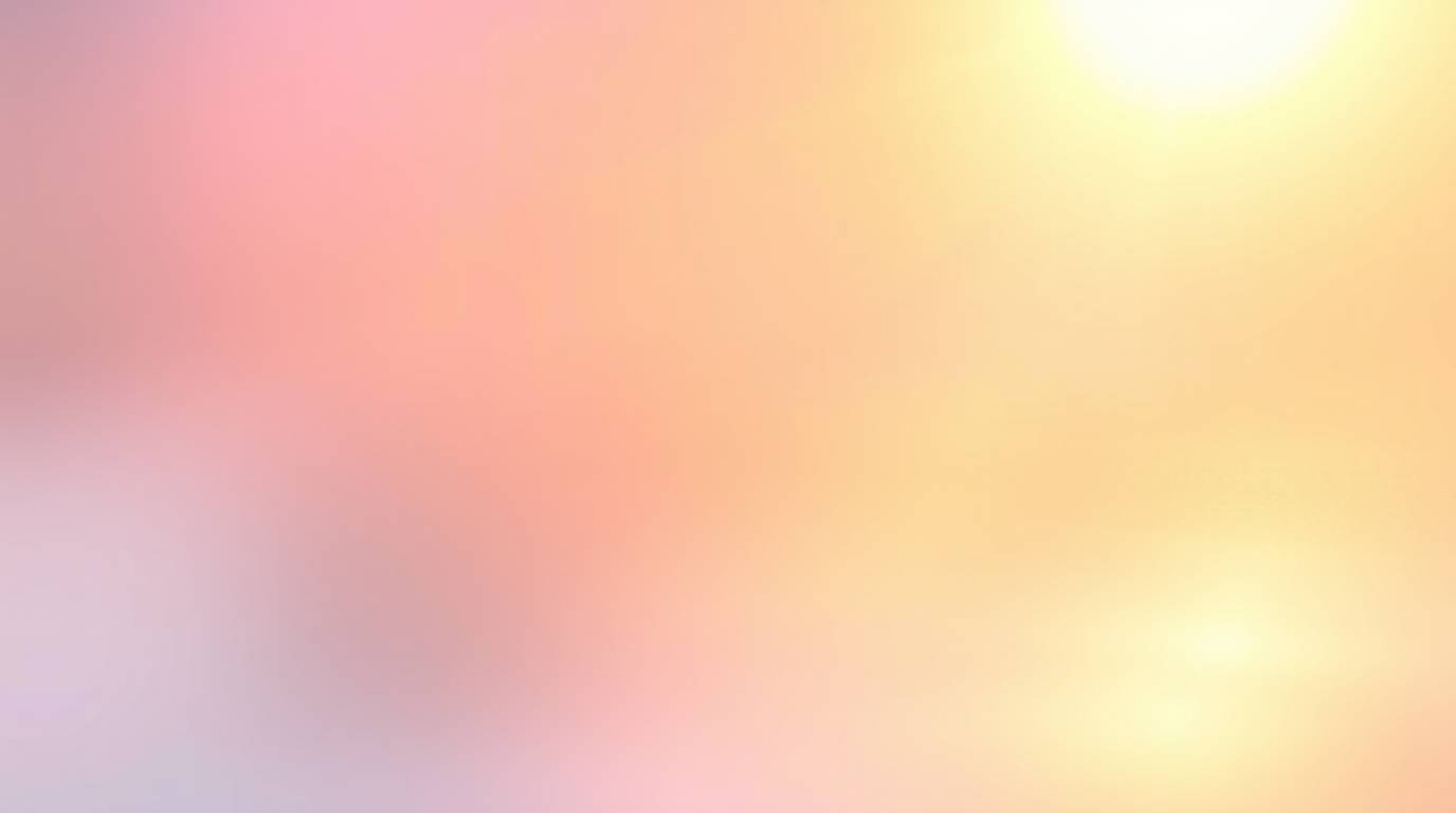 Experience the mesmerizing beauty of warm, golden hour light caressing a metallic surface adorned with a soft pastel iridesce