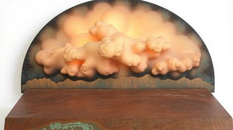 This cast bronze surface captures the drama of a thunderstorm illuminated by a vibrant sunset. Featuring natural earth tones 