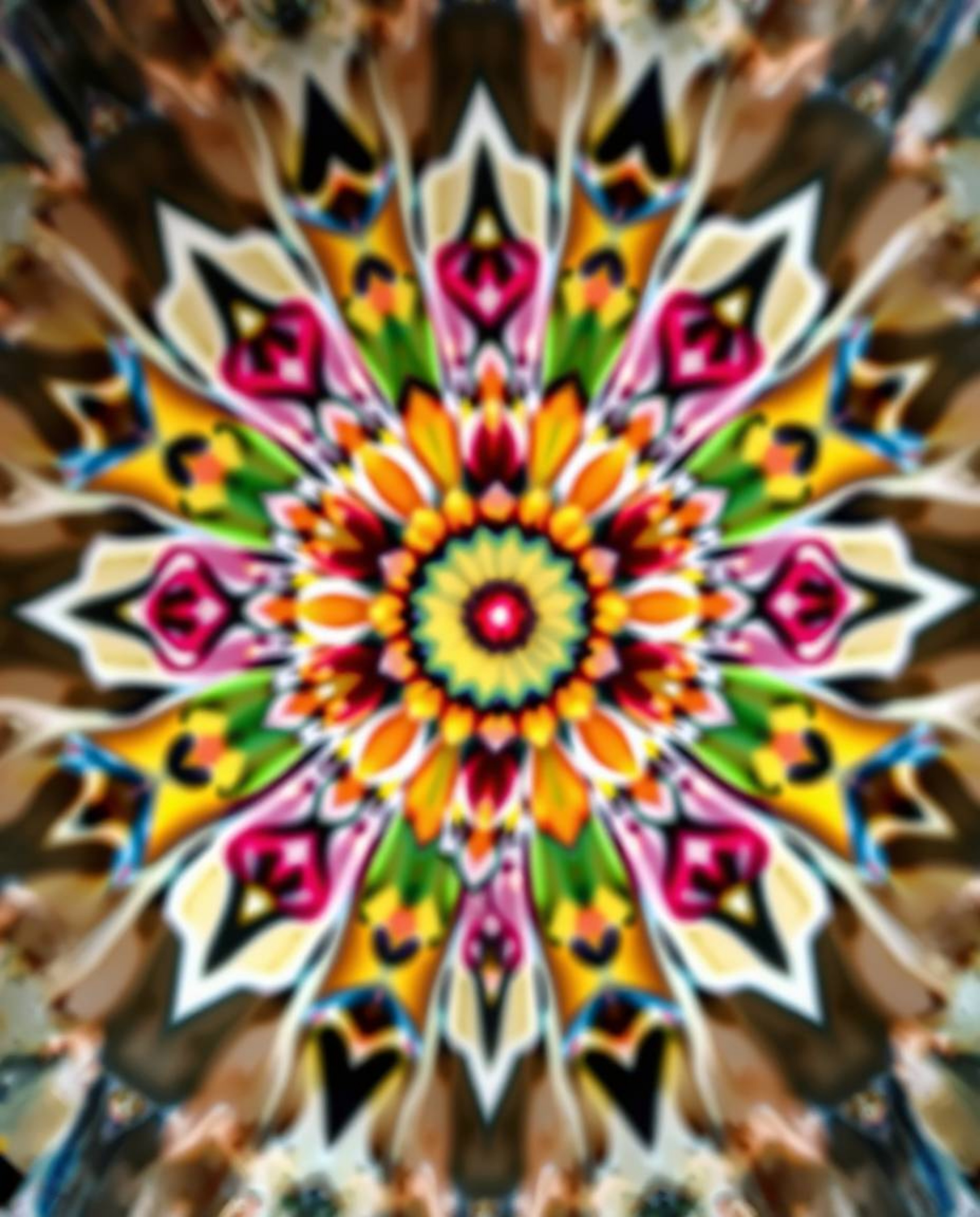 A stunning high-angle view showcasing a geometric floral mandala bursting with vibrant colors and a perfectly symmetric desig
