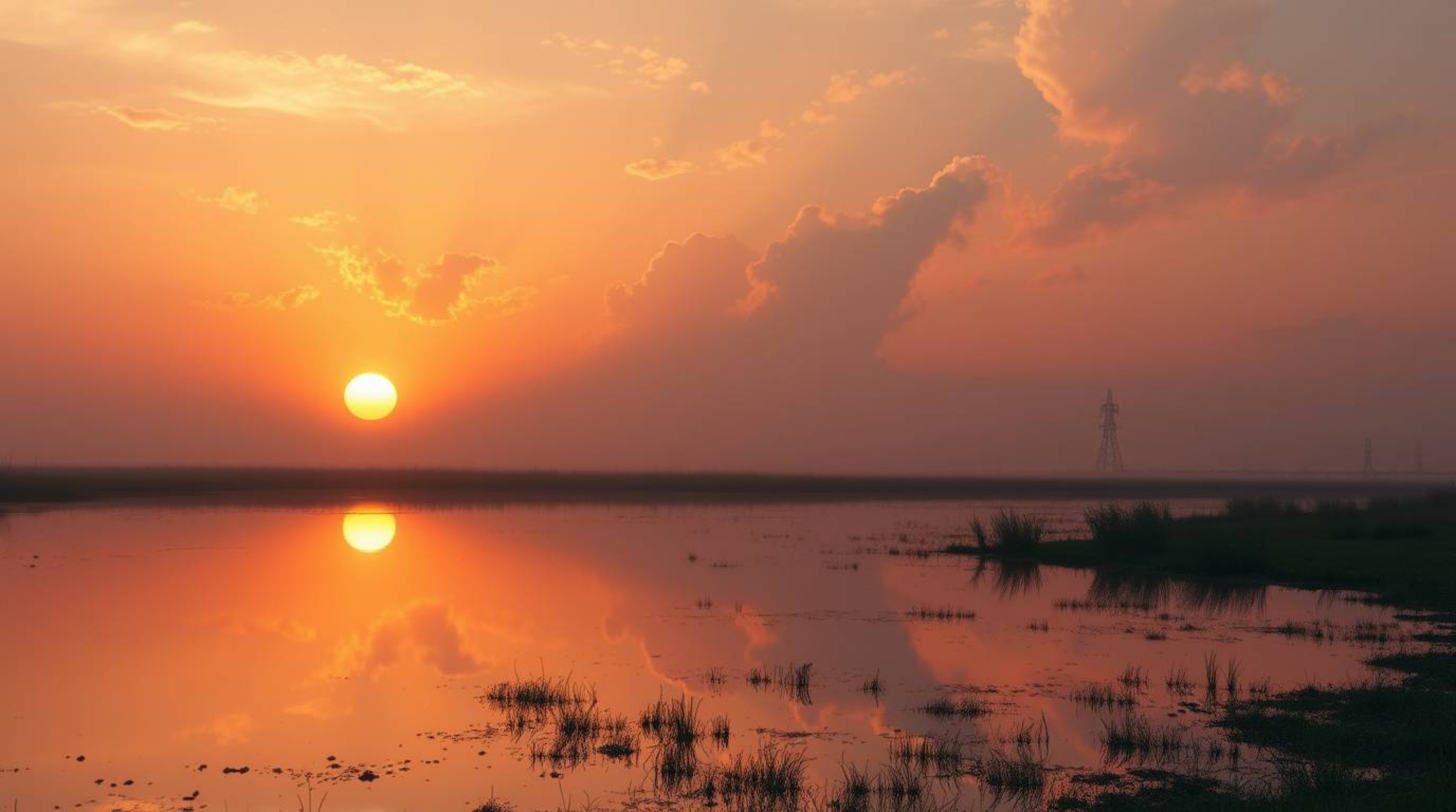 Capture the beauty of nature with this high-resolution stock photo showcasing an epic scene of a vibrant sunset mirrored in a