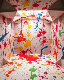 Experience a visual explosion of color and form with this intricate origami-style depiction of a room engulfed in paint. Capt