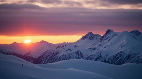 A graceful and elegant fine art photograph showcasing snow-covered mountains bathed in the warm glow of a pastel sunset. The 