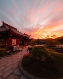 Dynamic motion image of a warm sunset over a serene Zen garden featuring vibrant reds, oranges, and yellows with blurred line