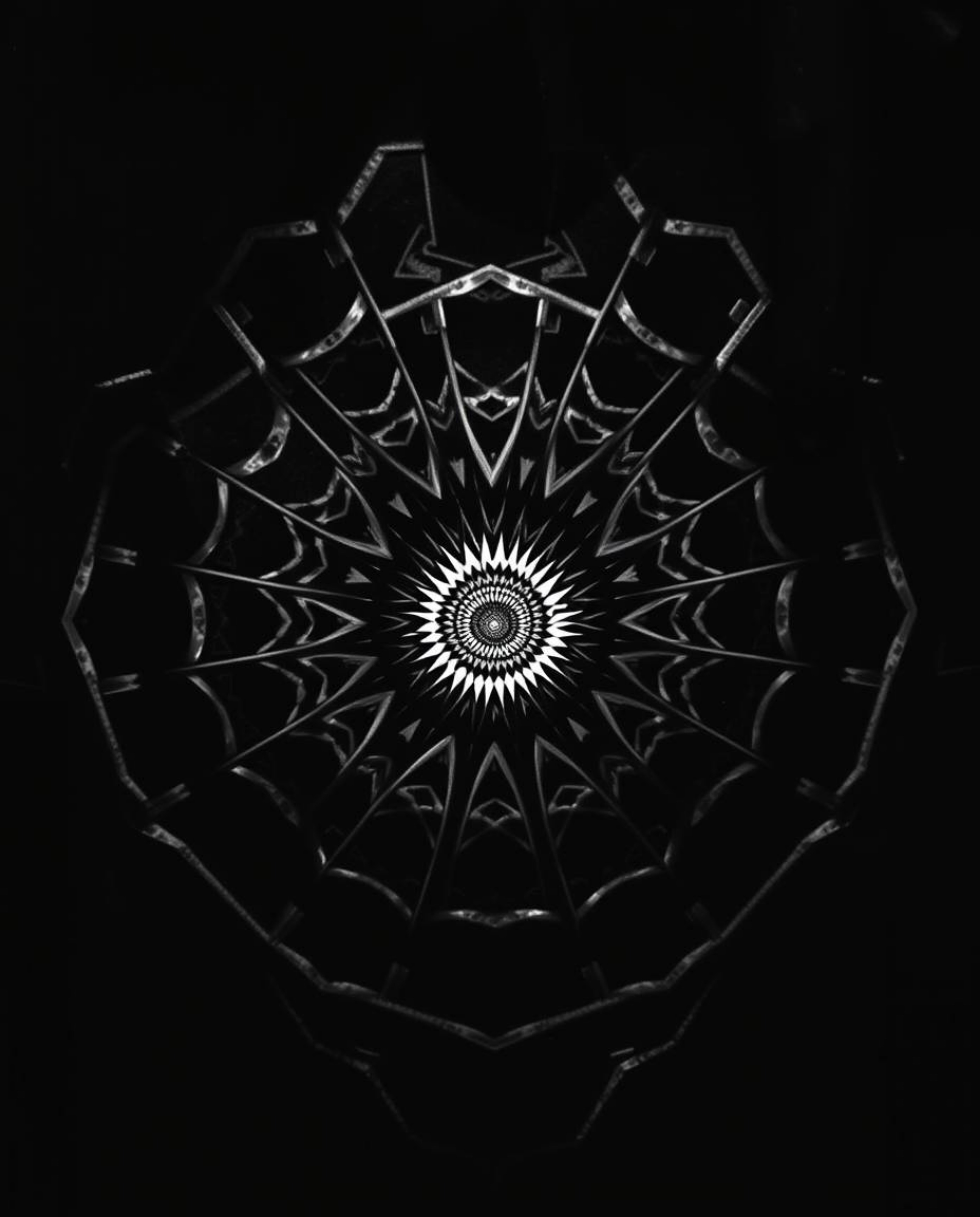 This captivating black and white image creates an eerie and creepy atmosphere with its geometric pattern optical illusion, re