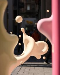 Explore captivating candid street photography showcasing abstract liquid forms rendered in 3D with a soft, pastel color palet