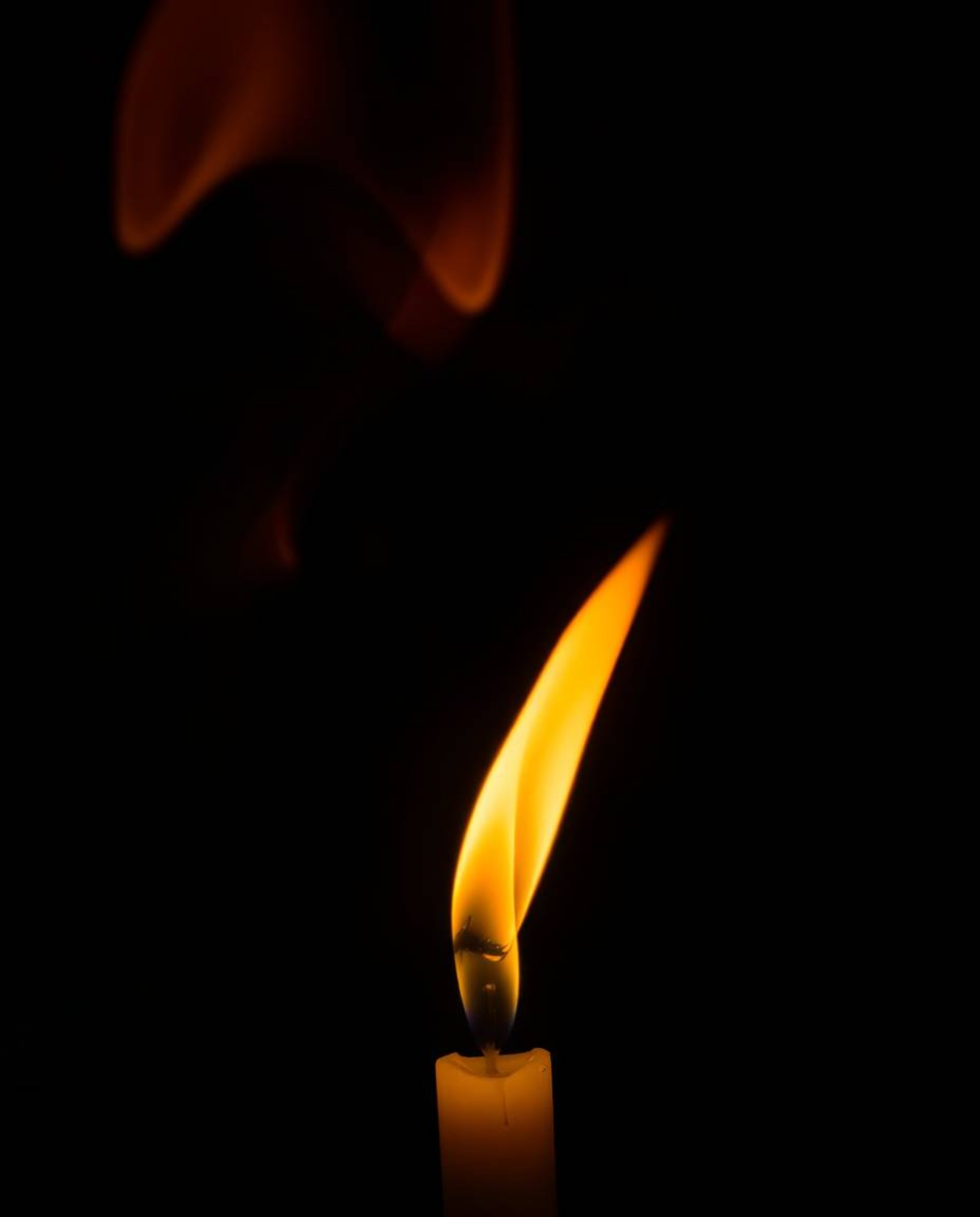 Capture the mesmerizing beauty of warm candlelight in this unusual and original fine art photograph. Dynamic colorful splashe