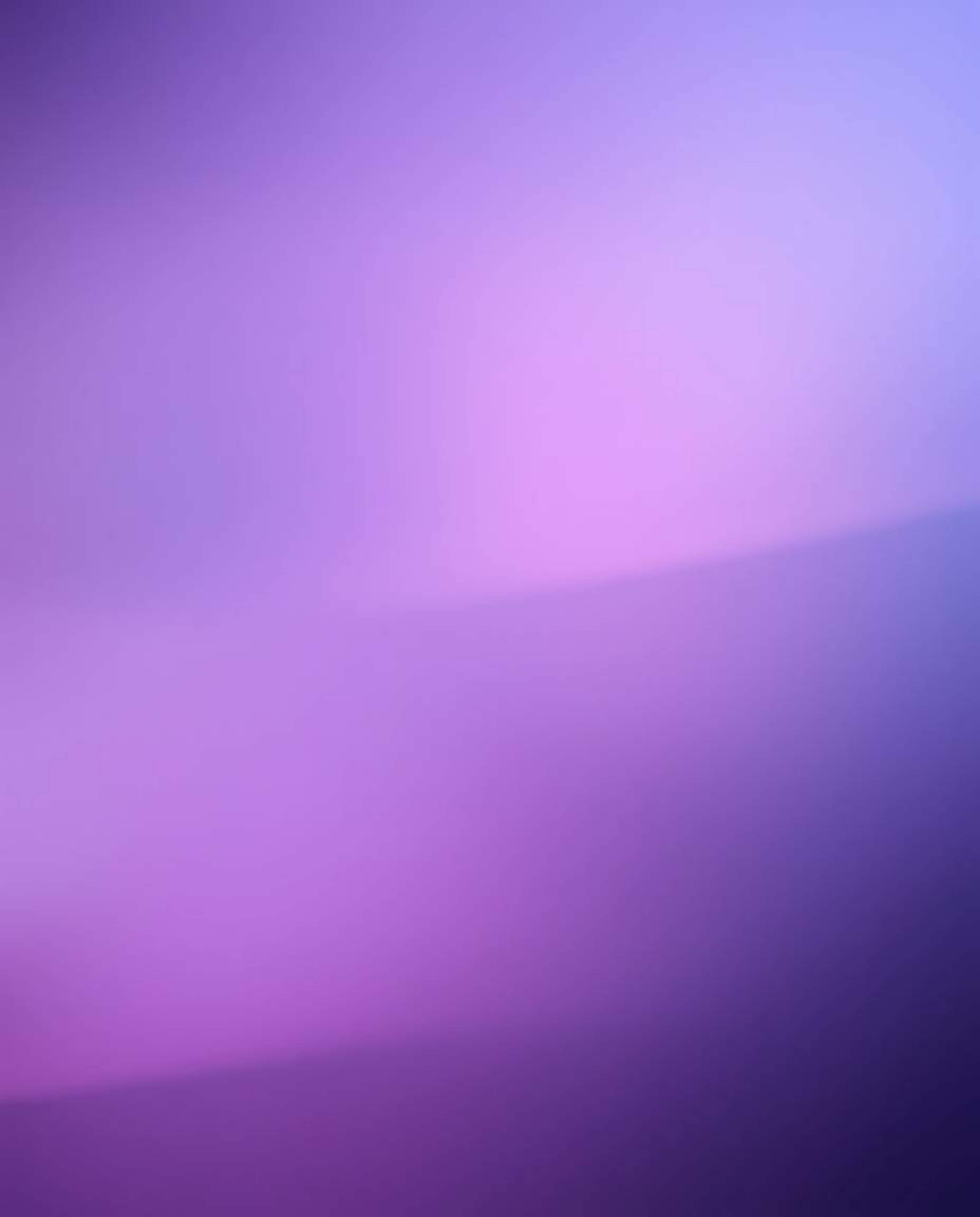 A captivating long exposure photograph showcases a mystic and enchanting scene.  Soft pink, blue, and violet hues blend seaml