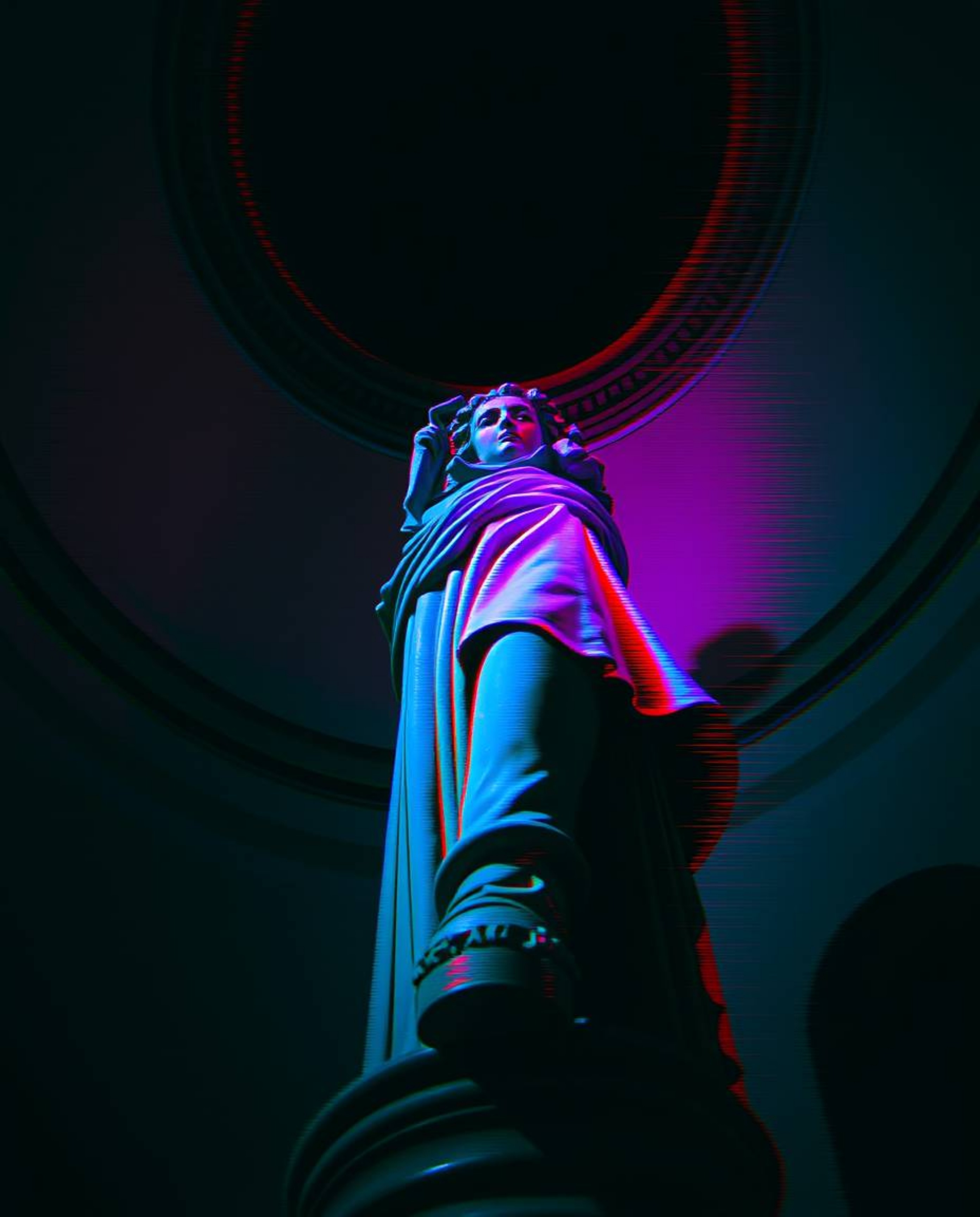 A dramatic low-angle shot showcases a classical sculpture infused with a vibrant glitch effect.  The digital corruption theme