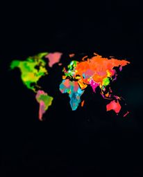 Explore a visually stunning abstract concept featuring a world map constructed from bright, colorful splashes set against a m