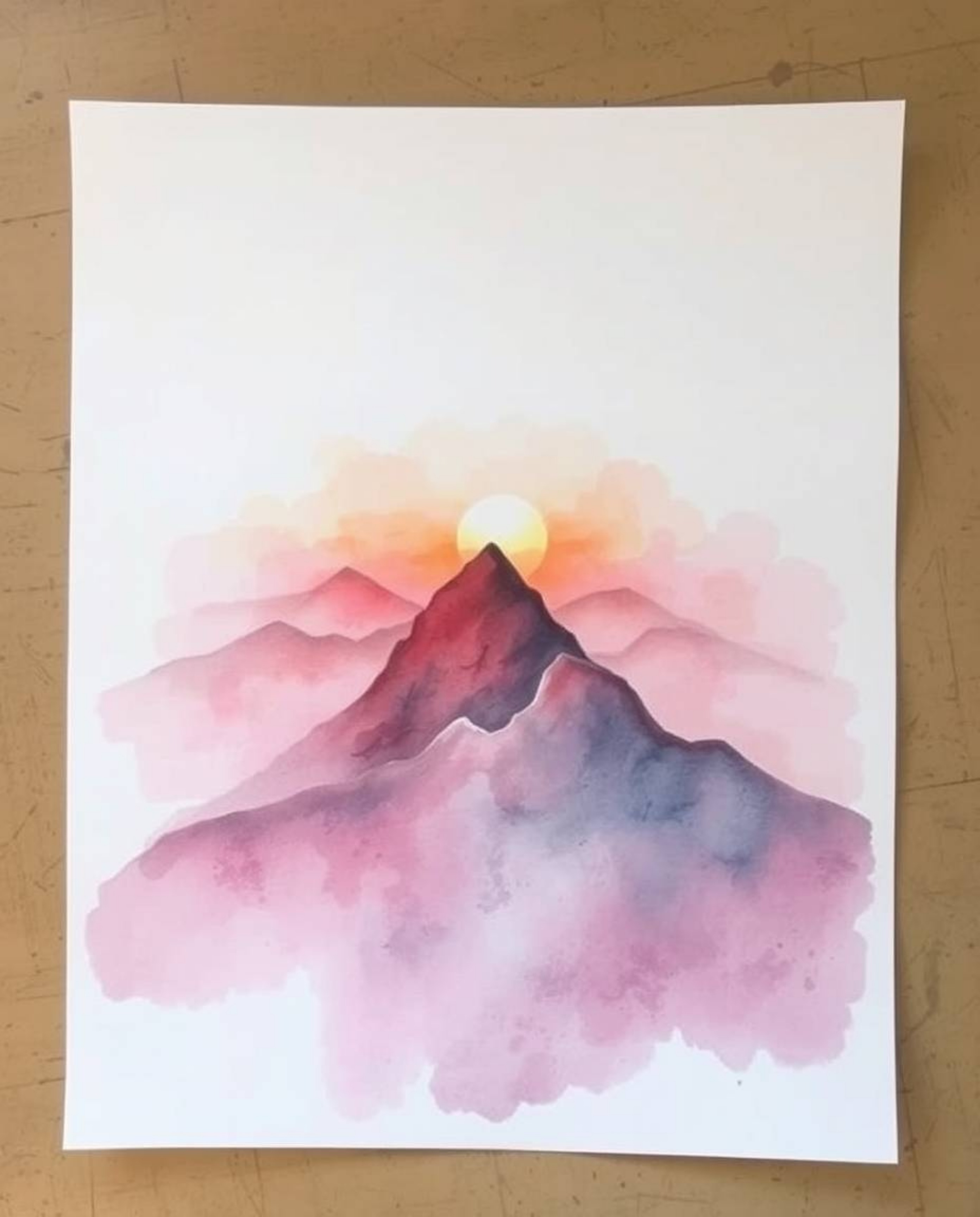 This delicate watercolor painting evokes a soft, dreamy atmosphere, depicting a hazy sunset from a high alpine peak. Utilizin