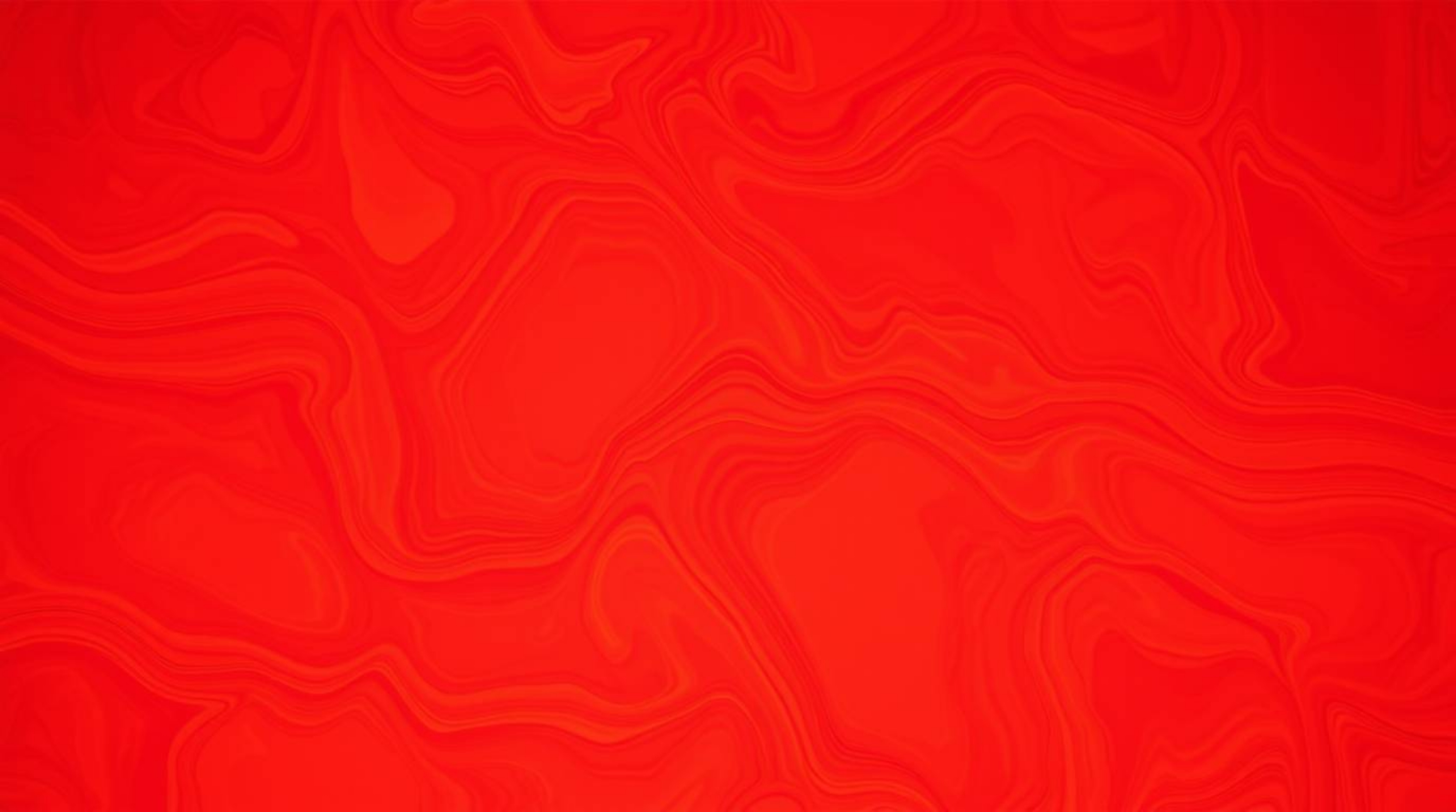 This fine art photograph showcases an unusual and original composition of warm neon gradient textures flowing across a liquid