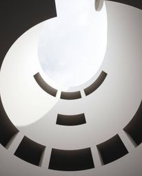 Explore the captivating world of minimalist geometric art in the Bauhaus style, featuring a dramatic low-angle perspective an